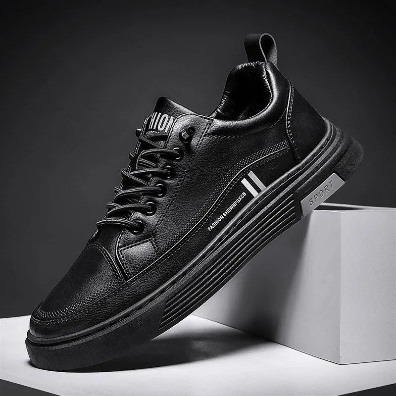 Men's white and black low-top skateboard shoes with elastic band fastening and rubber sole.