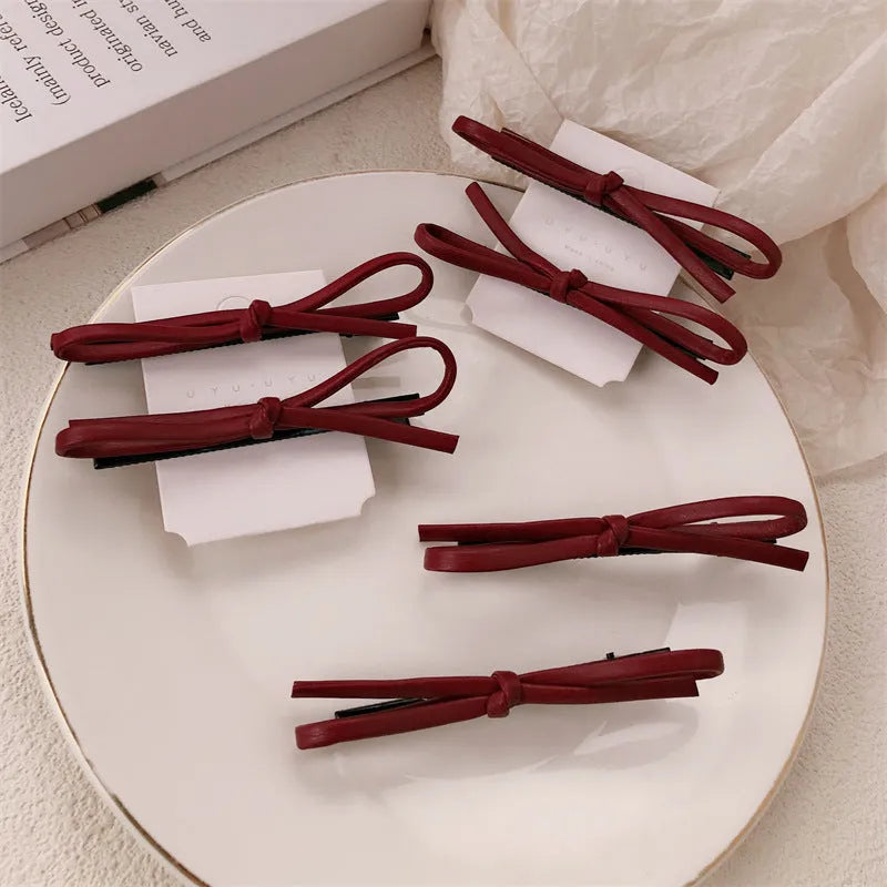 Wine red leather bow barrette hair clip for women available in single or pair pack