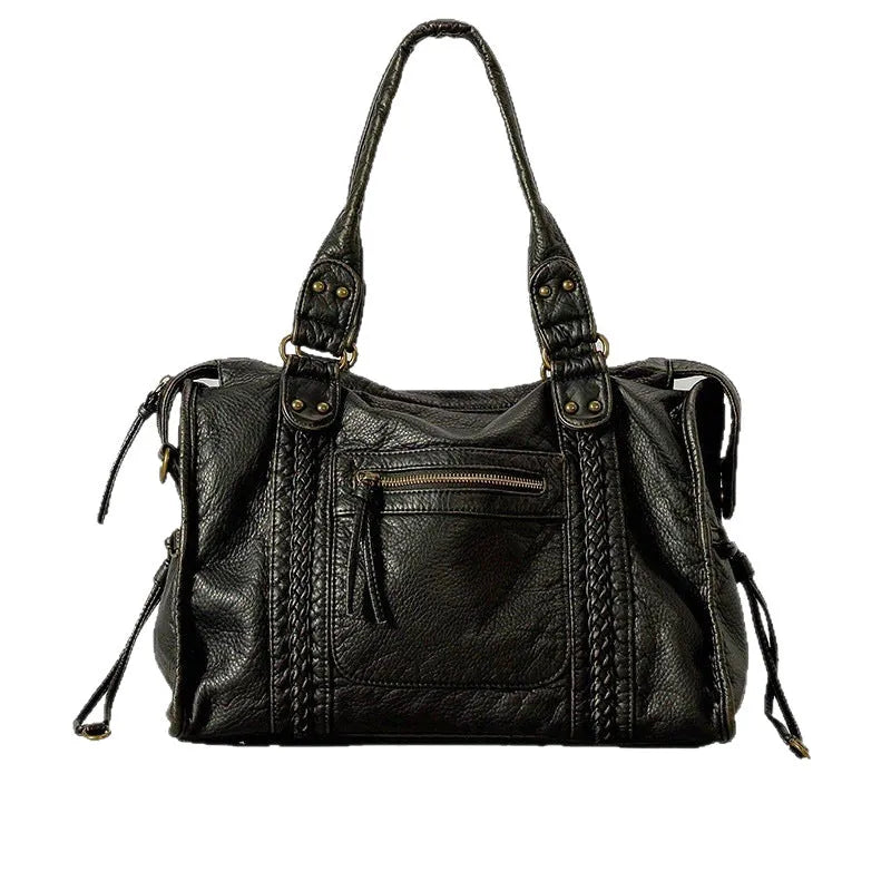 Women's retro shoulder messenger bag in soft PU leather with internal compartments and weaving detail