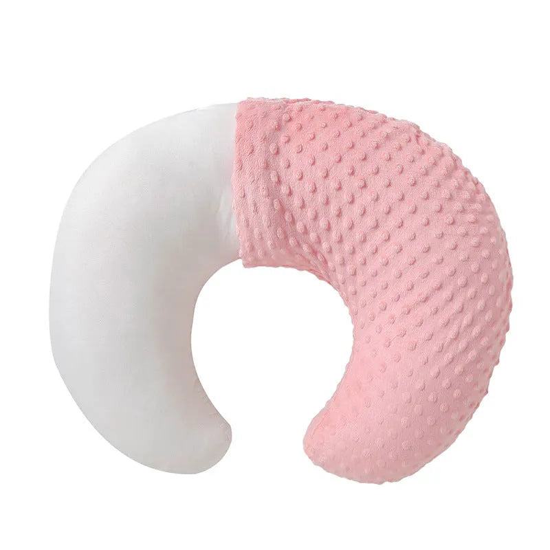 Multifunctional nursing pillow with milk spill prevention in pink colour for breastfeeding support