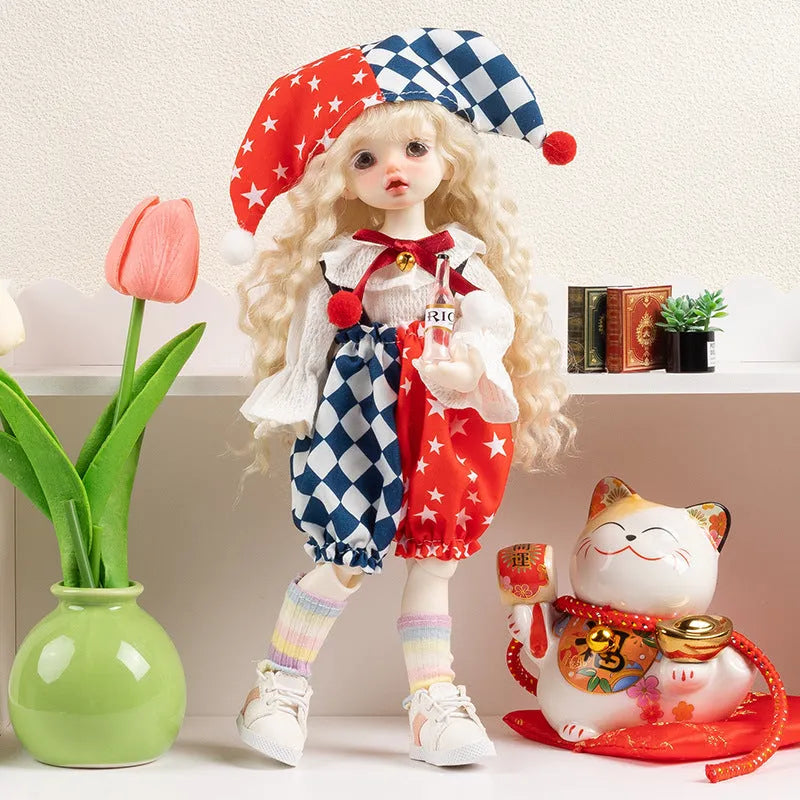 Printed cloth doll clothes for fashion dolls in various colourful patterns sold separately without dolls