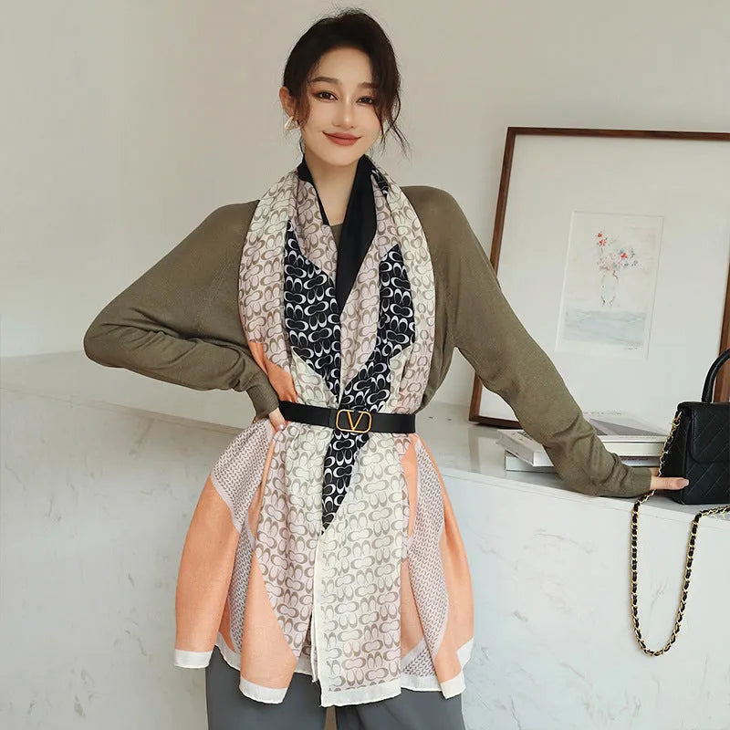 Elegant printed polyester scarf for women, shown in a style option, measuring 90cm by 180cm.