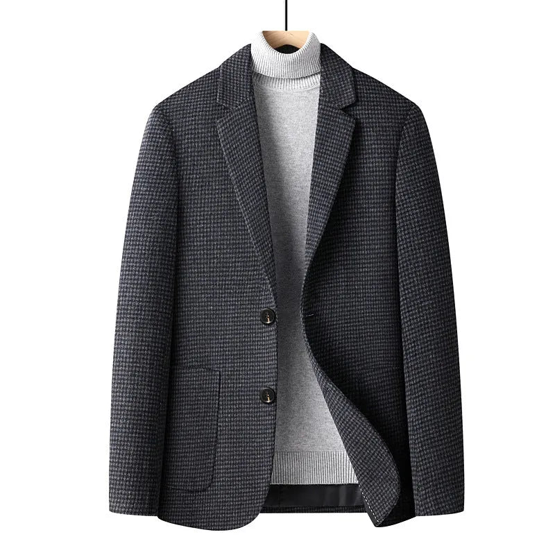 Men's slim-fit wool suit jacket in grey, shown on a hanger.