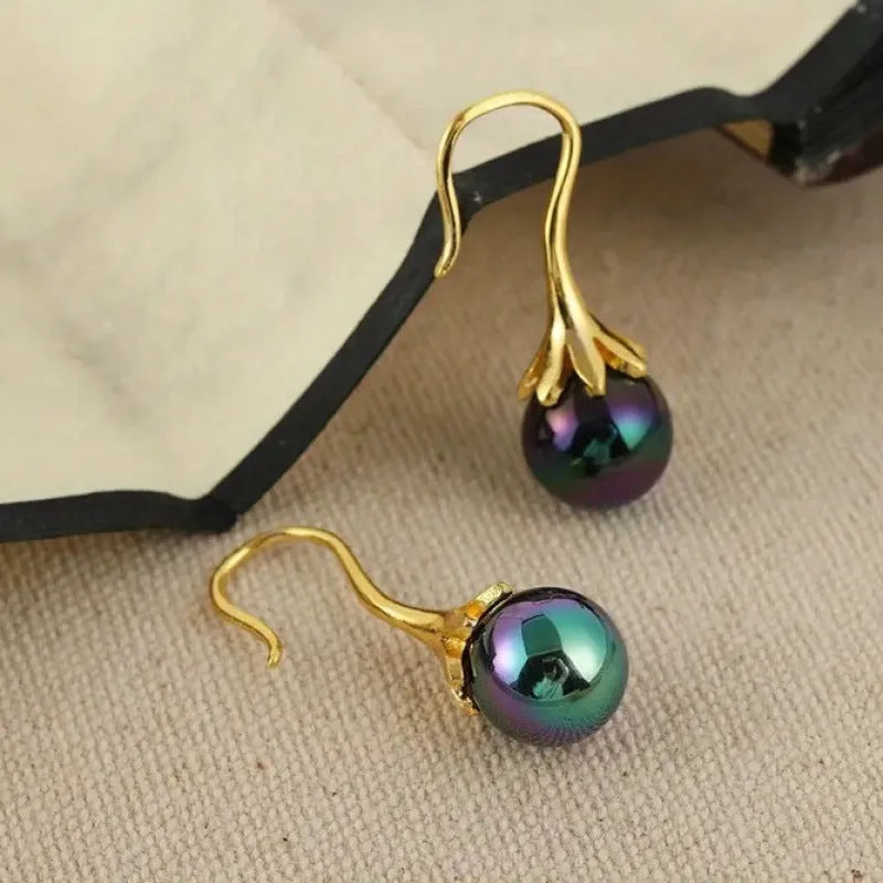 Retro fashion women's earrings with imitation gold electroplated finish and personalised creative design