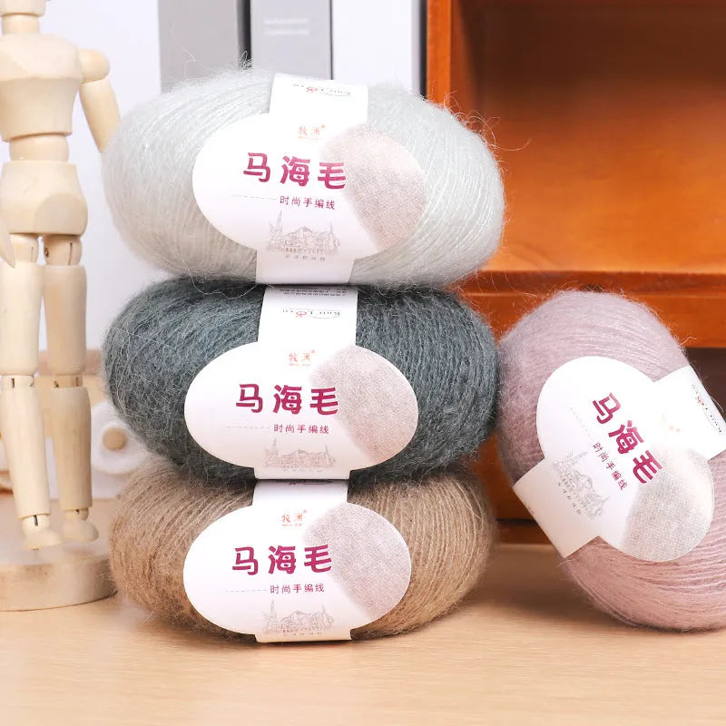 Mohair wool ball for DIY scarf knitting in assorted colours on white background