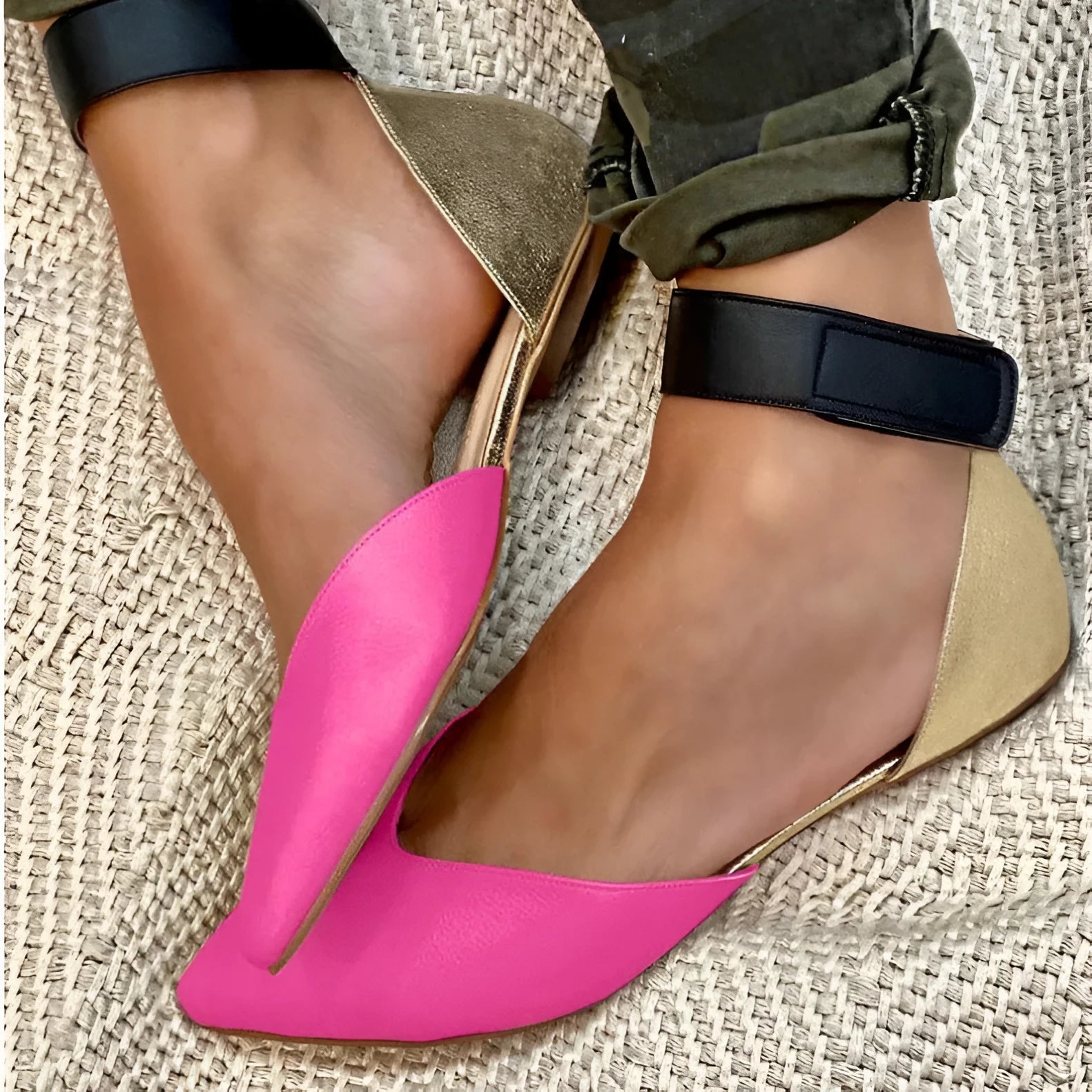 Women's beige casual sandals with Velcro straps and a hollowed flat sole on a light background.
