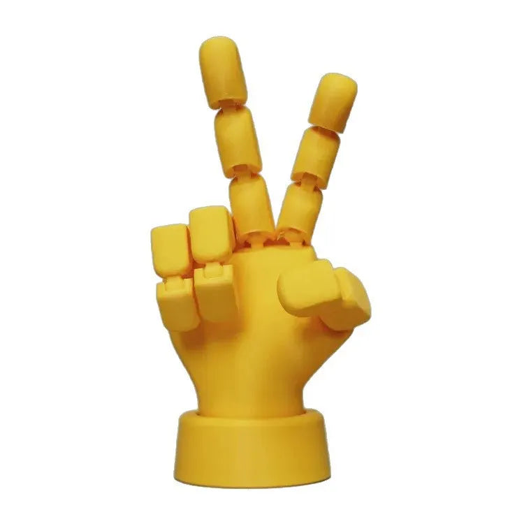 Yellow American-style hand ornament with movable joints made from PLA plastic.