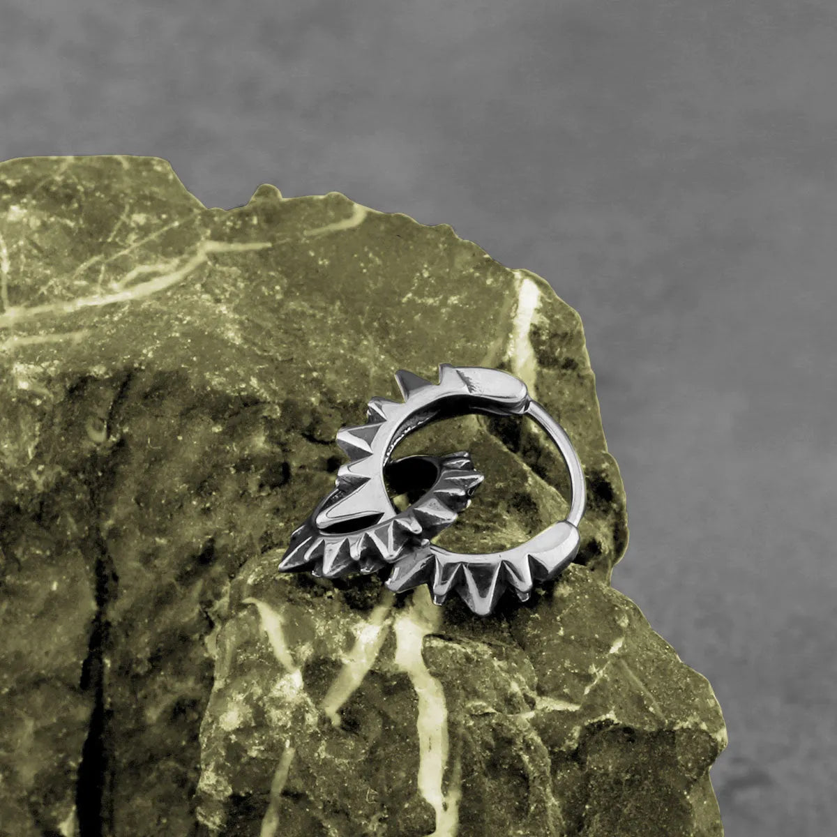 Stainless steel round ring earrings with polished steel finish and retro styling