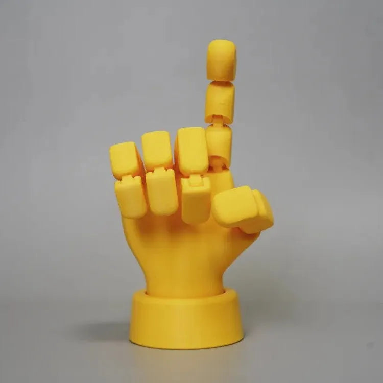 Yellow American-style hand ornament with movable joints made from PLA plastic.