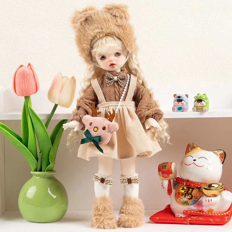 Printed cloth doll clothes for fashion dolls in various colourful patterns sold separately without dolls