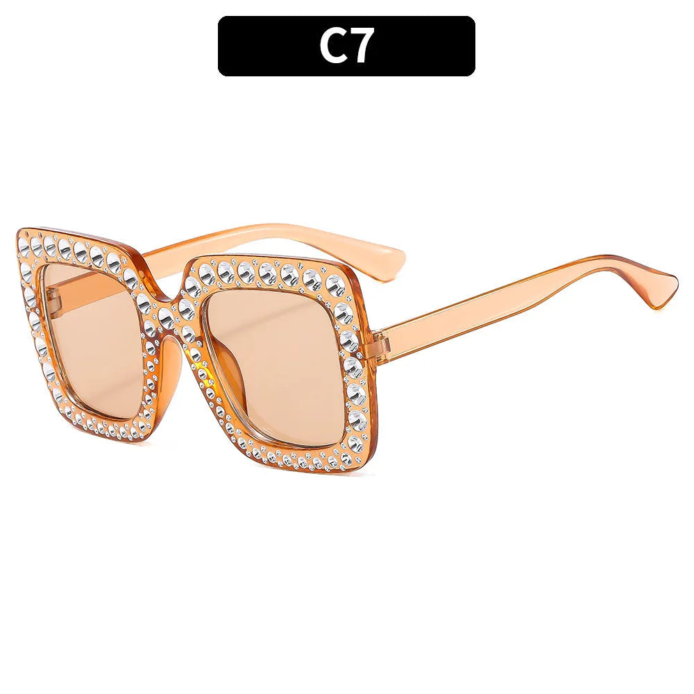 Plastic box sunglasses with multiple colour combinations including black frame grey piece and bright coloured options