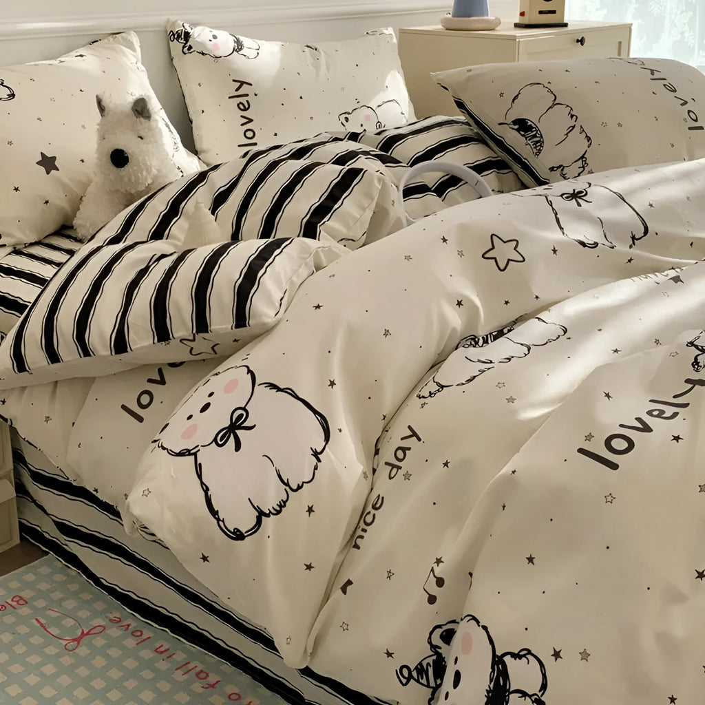 Cartoon dog pattern cotton bedding four-piece set shown on bed with reactive printed designs