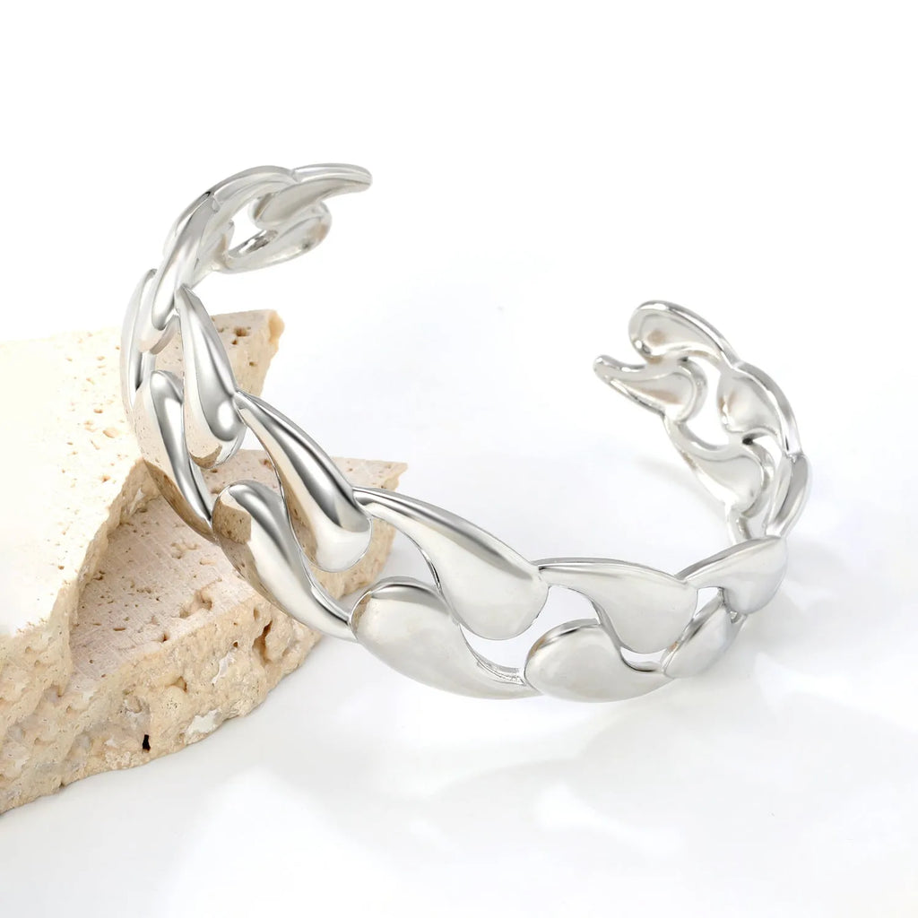 Women's stainless steel adjustable bracelet with alloy detailing in gold and silver tone colour options
