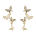 Women's copper butterfly earrings with four motifs and gold-plated drops