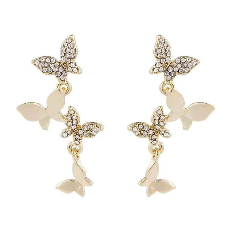 Women's copper butterfly earrings with four motifs and gold-plated drops