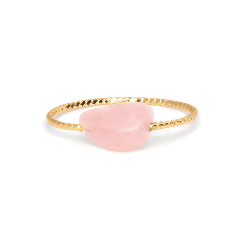 Original geometric women's agate ring on a hand, showing unique stone banding in one of eight colour options.