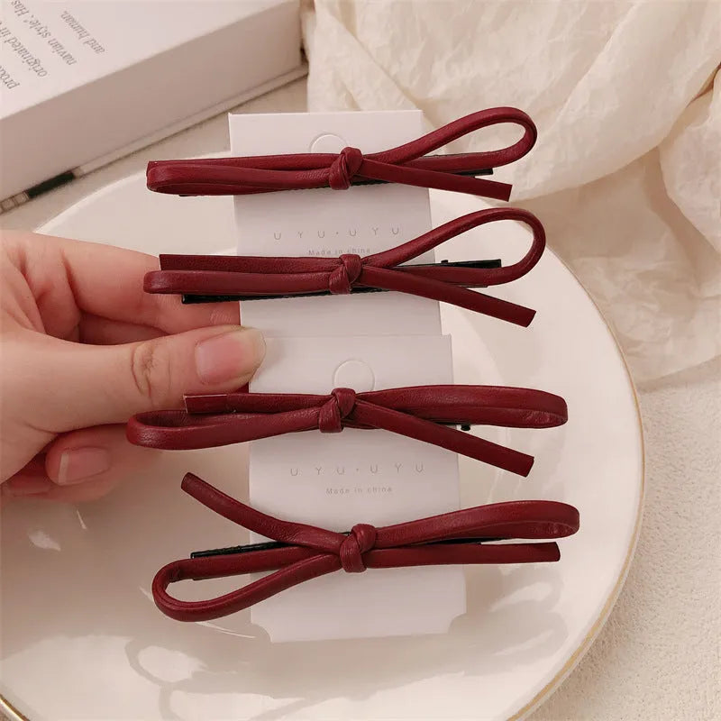 Wine red leather bow barrette hair clip for women available in single or pair pack