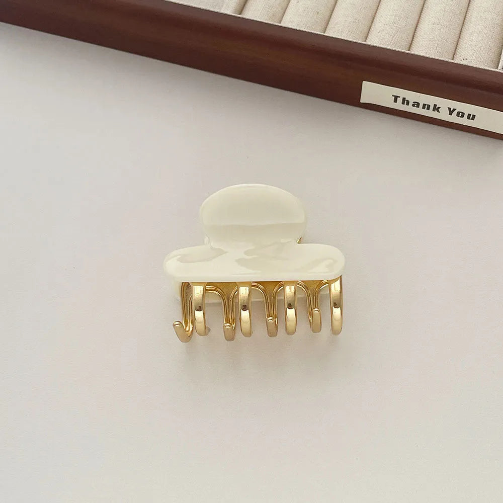 Women's retro acetate barrettes with metal grip in beige, white, ink, or leopard print colours