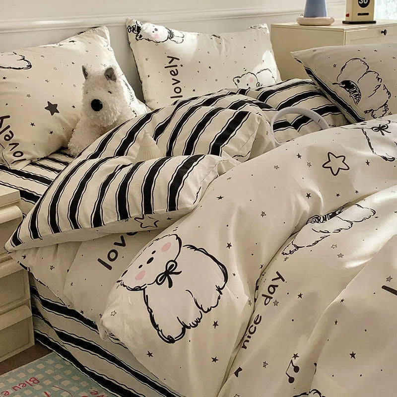 Cartoon dog pattern cotton bedding four-piece set shown on bed with reactive printed designs