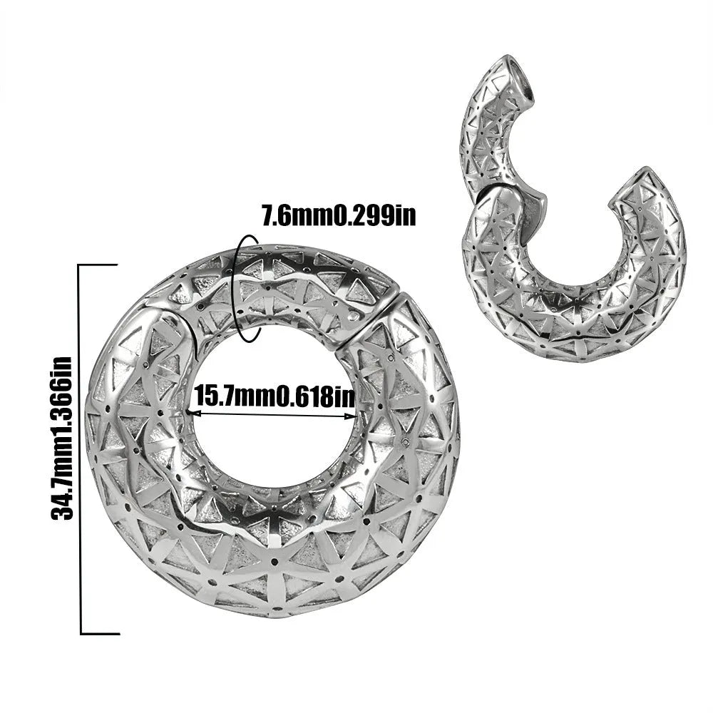 A pair of silver fashion earrings featuring a detailed totem pattern design on a stainless steel base.