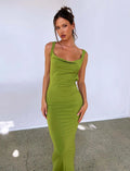 Champagne coloured backless slim fit dress with spaghetti straps and a hip-length skirt.