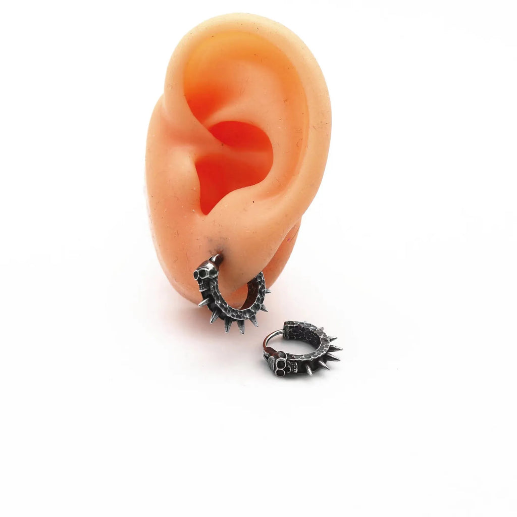 Pair of alloy earrings with copper plastic punk motorcycle design in retro black and geometric shape.