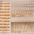 108 geometric pearl earrings with gold and yellow electroplated alloy and round pearl elements