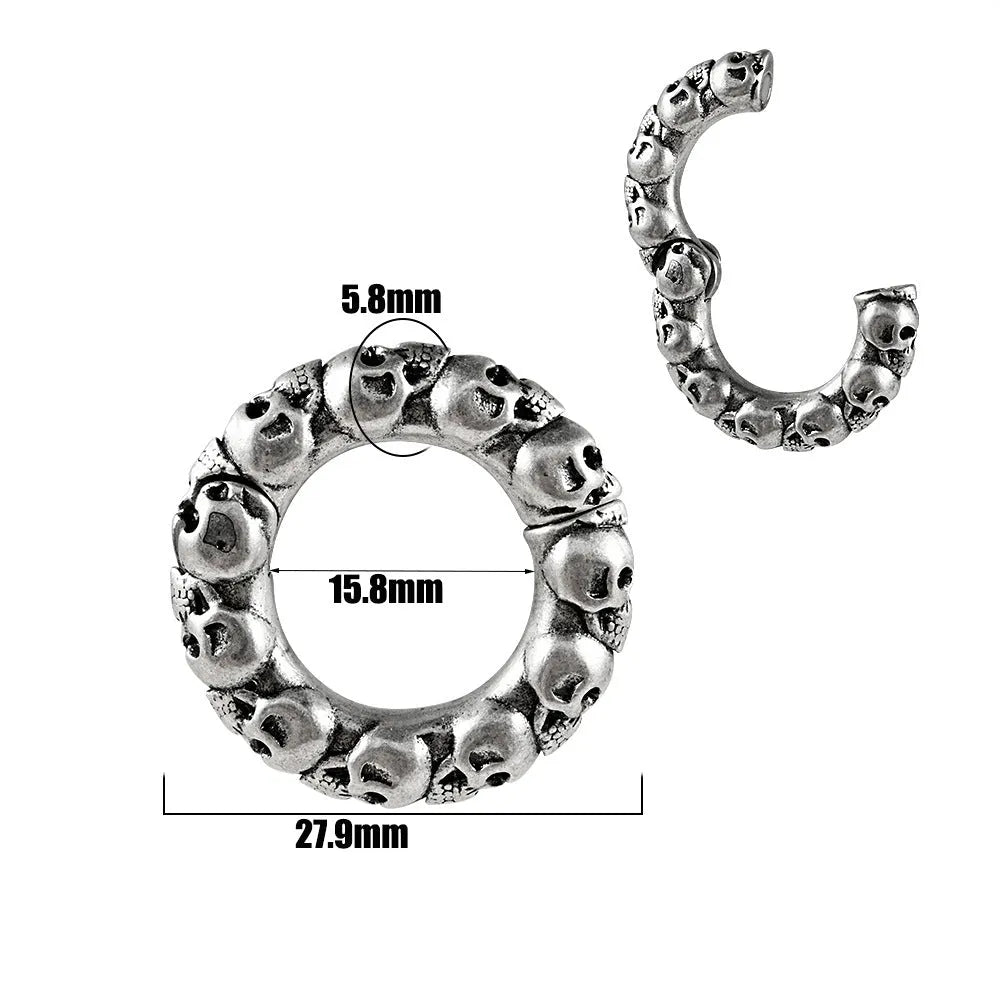 A pair of silver fashion earrings featuring a detailed totem pattern design on a stainless steel base.