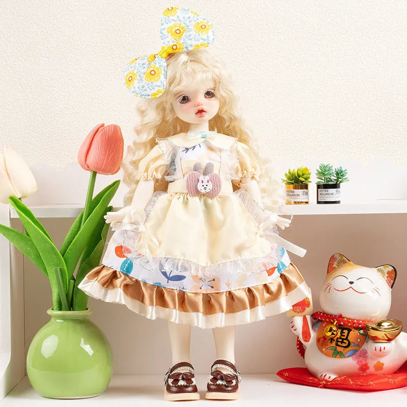 Printed cloth doll clothes for fashion dolls in various colourful patterns sold separately without dolls