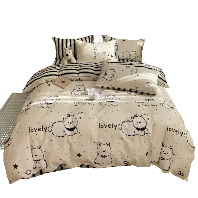 Cartoon dog pattern cotton bedding four-piece set shown on bed with reactive printed designs