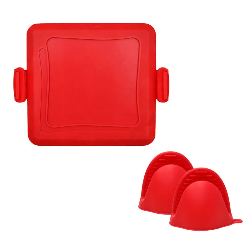 Red silicone baking tray with hand clamp attachment showing anti-scald design