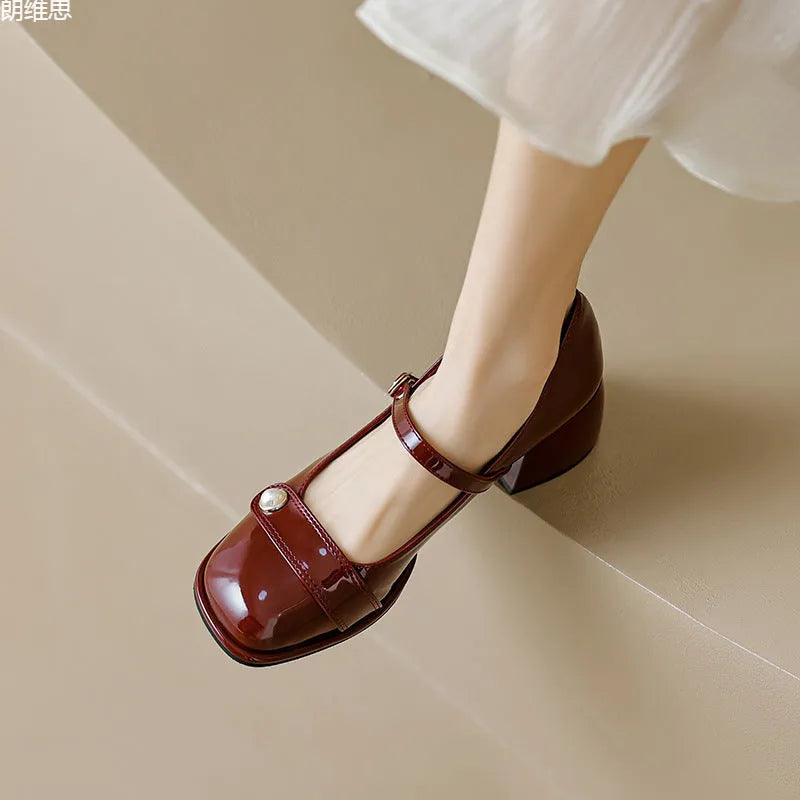 Women's patent leather chunky heel ankle boots with buckle fastening and square toe in three colour options