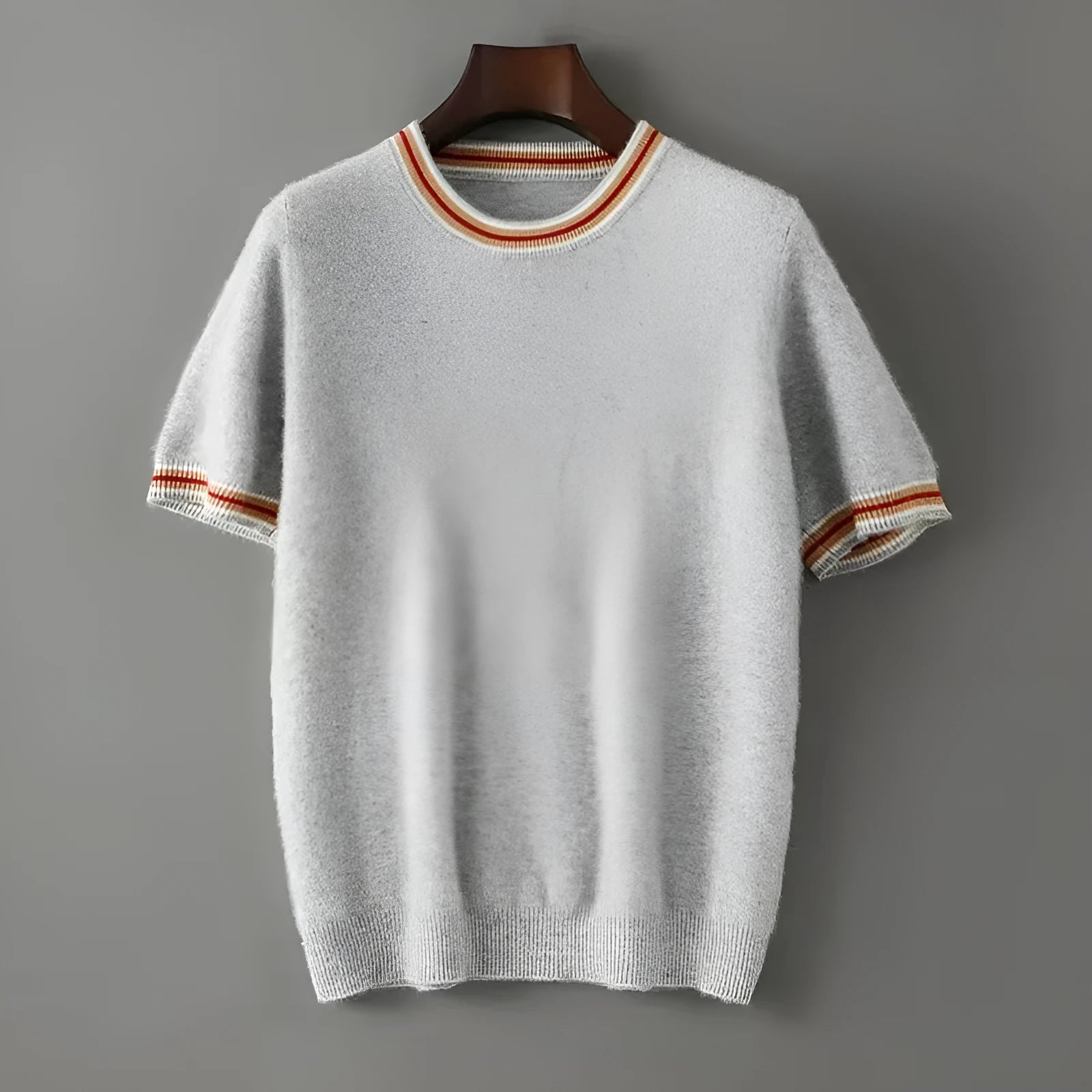 Men's round neck pure wool short sleeve sweater in grey showing regular sleeves and standard wool texture