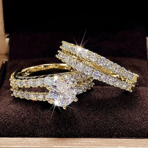 Women's geometric alloy ring set in silver, gold, or rose gold with round elements