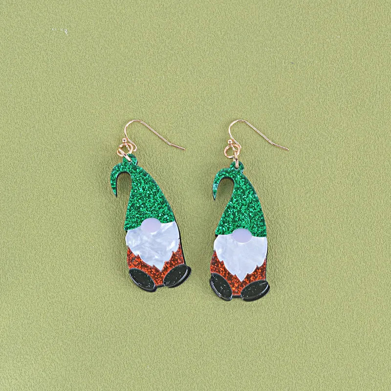 Pair of cartoon Santa Claus acrylic earrings in red and green hat style.