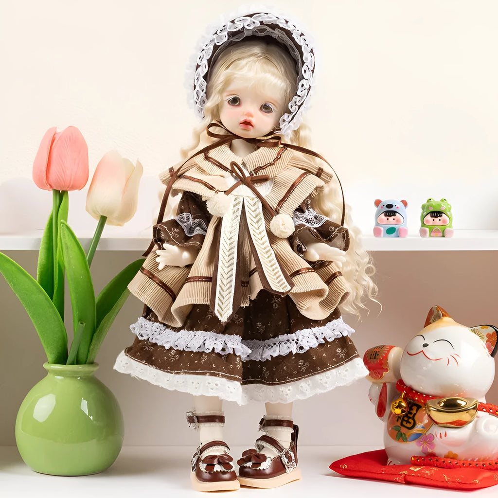 Printed cloth doll clothes for fashion dolls in various colourful patterns sold separately without dolls