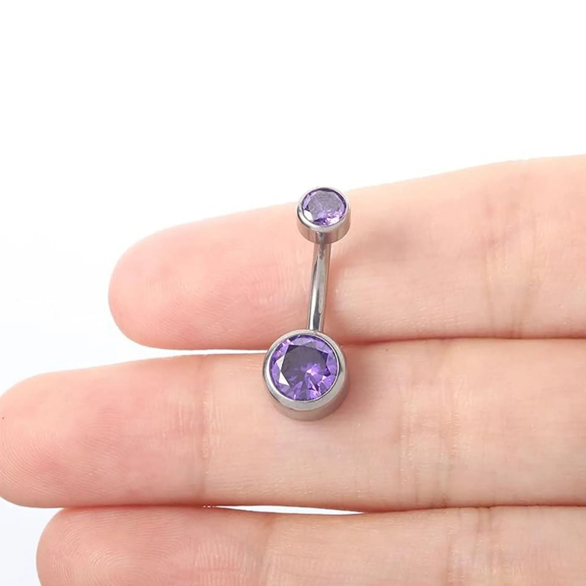 Double-headed zircon titanium alloy navel stud in multiple colours and sizes.