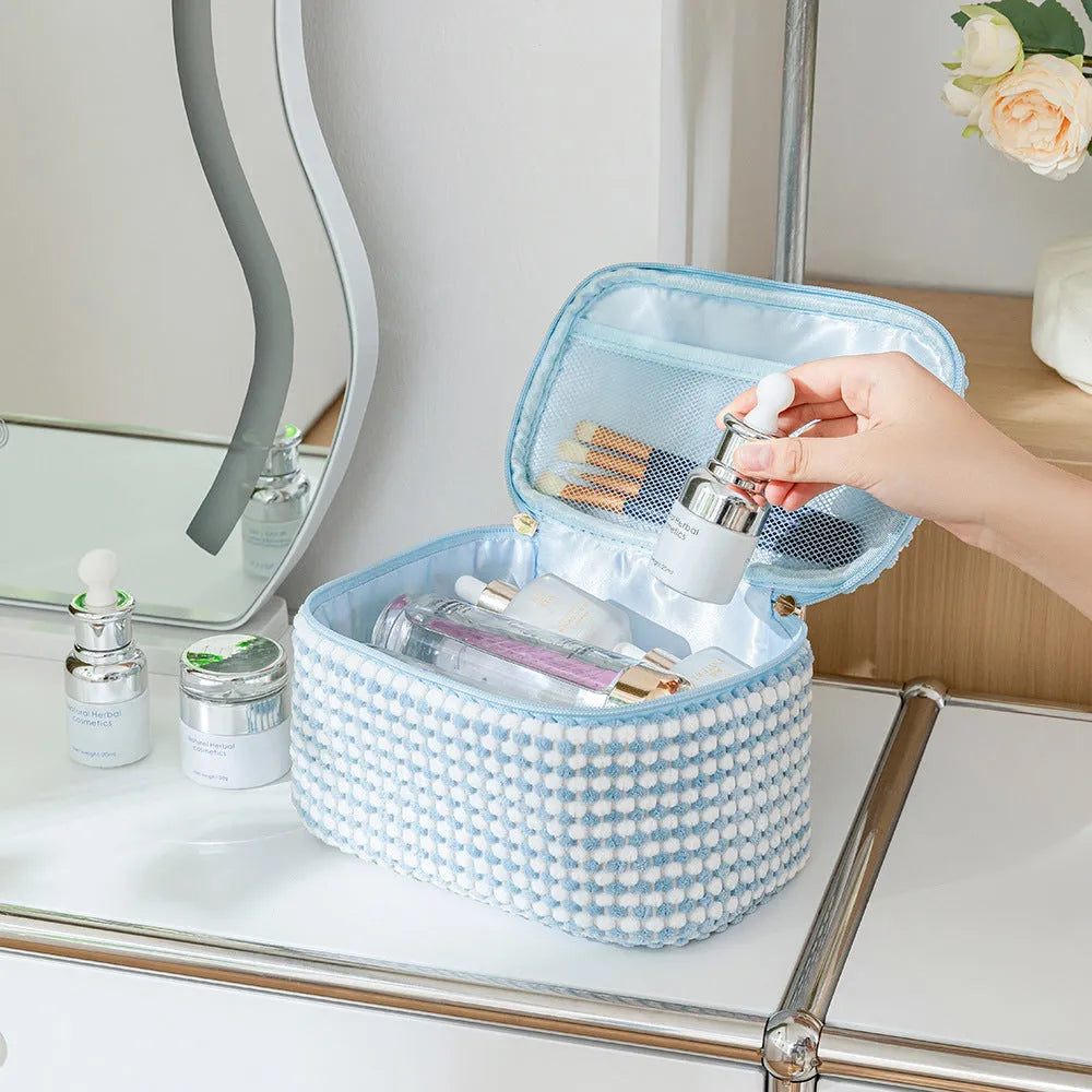 Four-piece flannelette makeup bag set in cube style design with polyester material