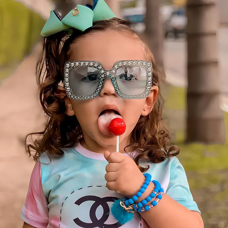 Plastic box sunglasses with multiple colour combinations including black frame grey piece and bright coloured options