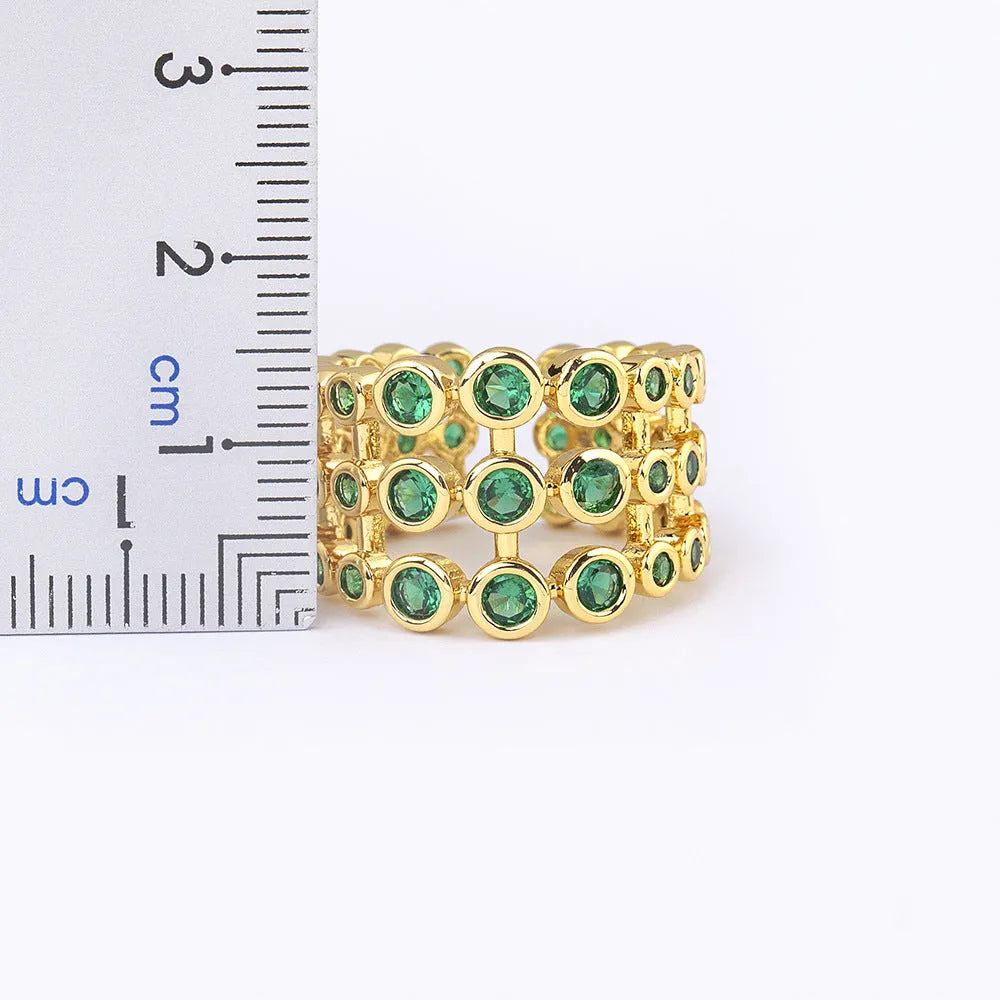 Copper ring with 18K gold three-layer plating and green zircon detailing on wide band