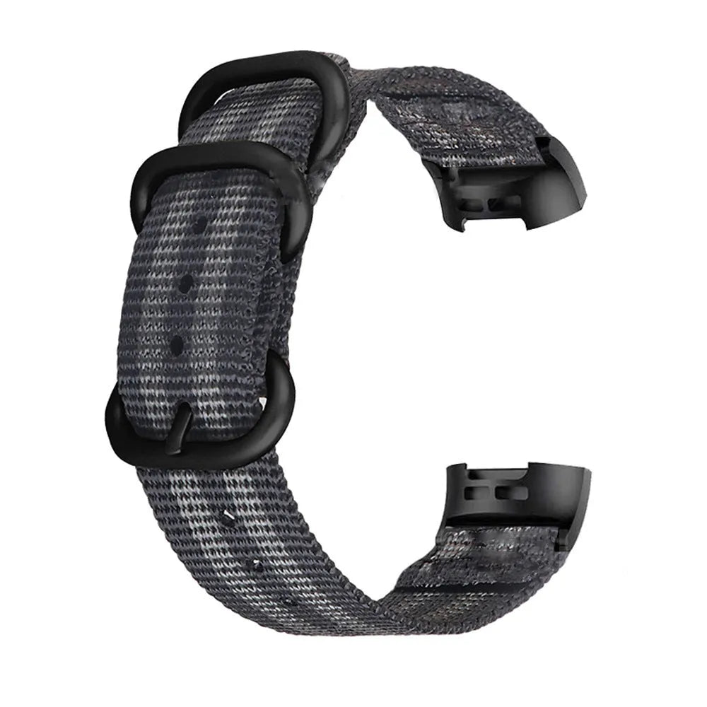 Nylon three-ring buckle replacement strap for Fitbit Charge fitness tracker in multiple colours.
