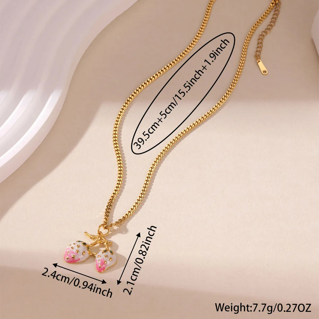 Stainless steel strawberry fruit pendant necklace on an alloy chain, shown in red and white colour options.