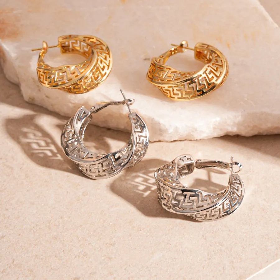 Women's geometric hollow stud earrings with twisted round design in silver or gold electroplated copper