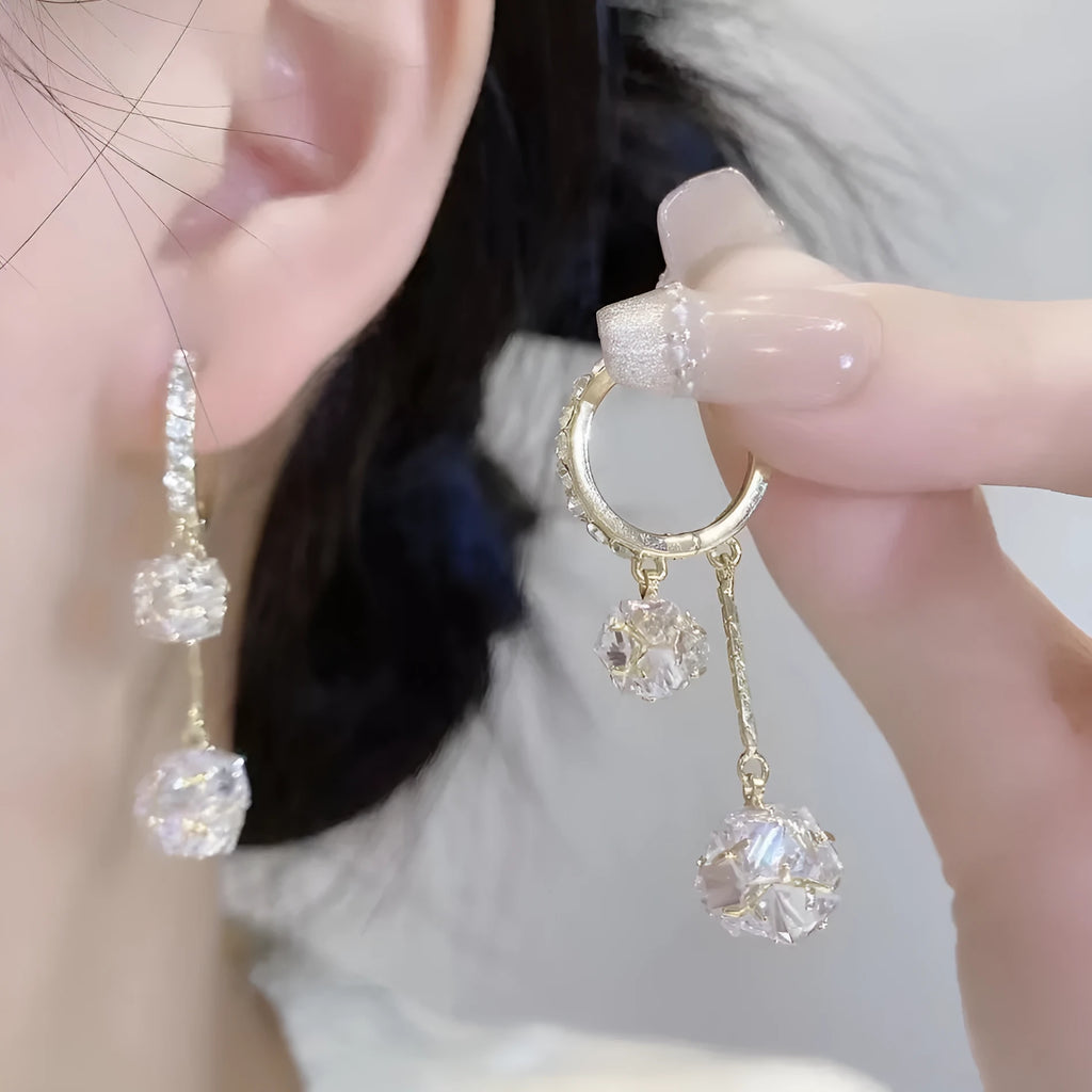 Silver drop shape earrings with tassel ball, rhinestone ball, and confession balloon pendant design