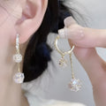 Silver drop shape earrings with tassel ball, rhinestone ball, and confession balloon pendant design