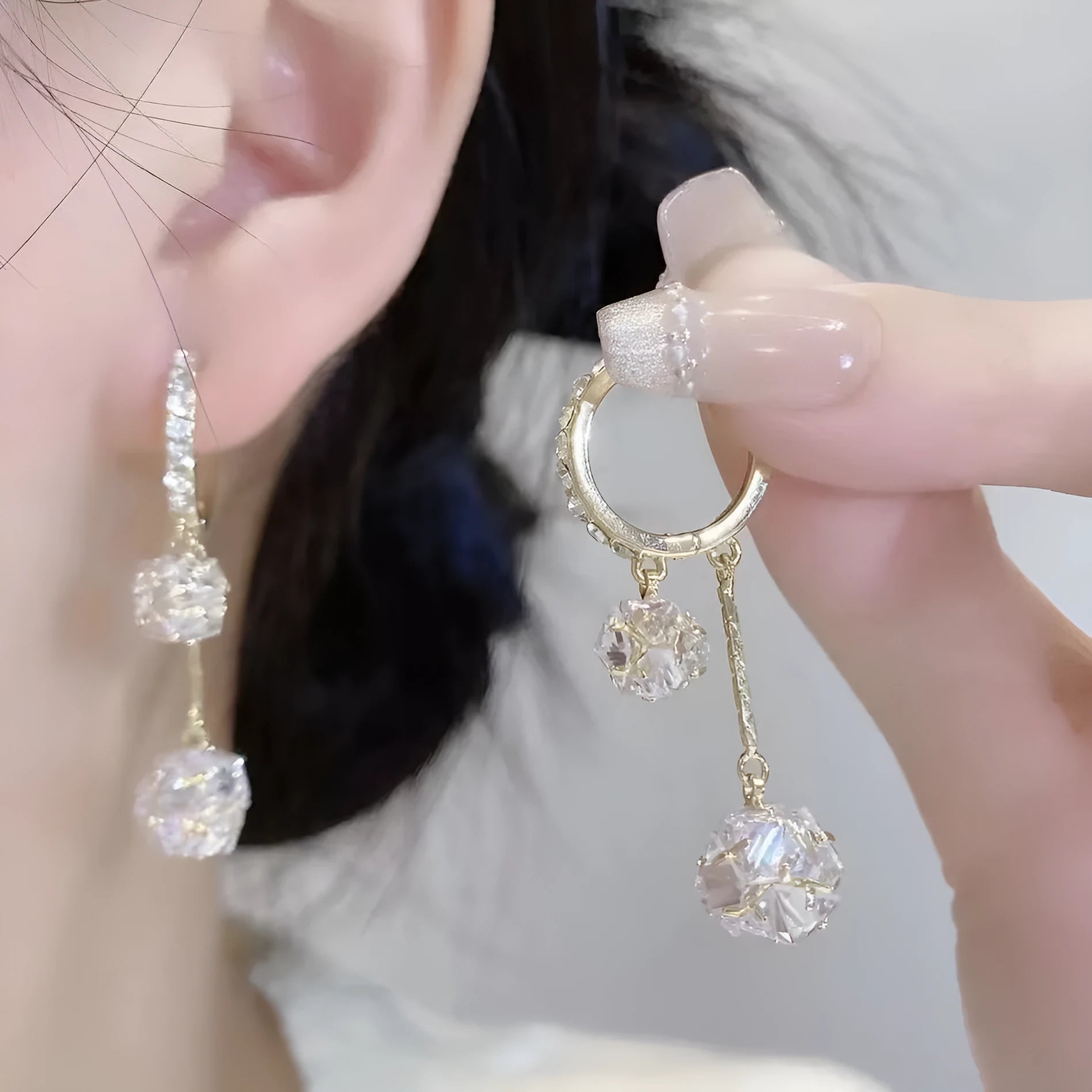 Silver drop shape earrings with tassel ball, rhinestone ball, and confession balloon pendant design