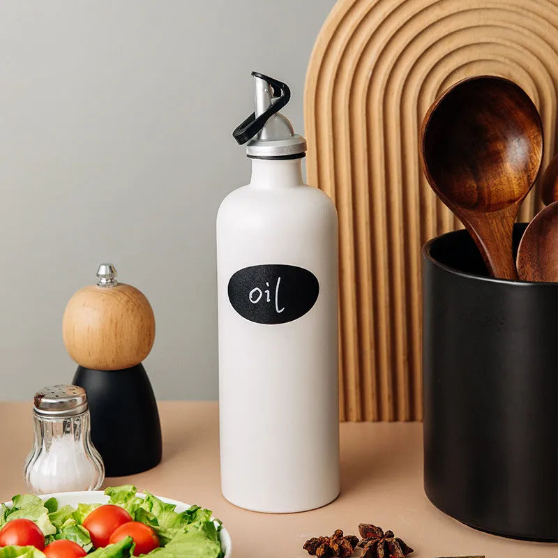 Ceramic oil pot with conical funnel and integrated brush in black, coffee or white colour