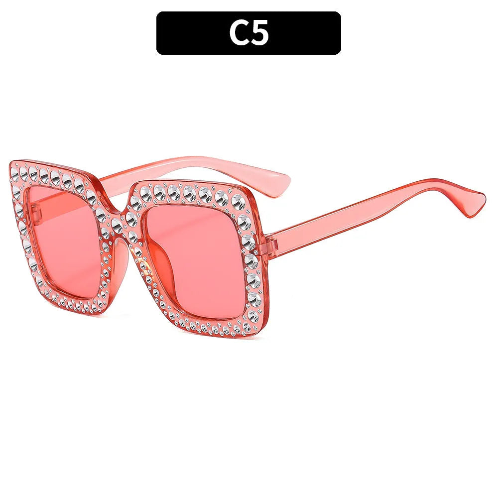 Plastic box sunglasses with multiple colour combinations including black frame grey piece and bright coloured options