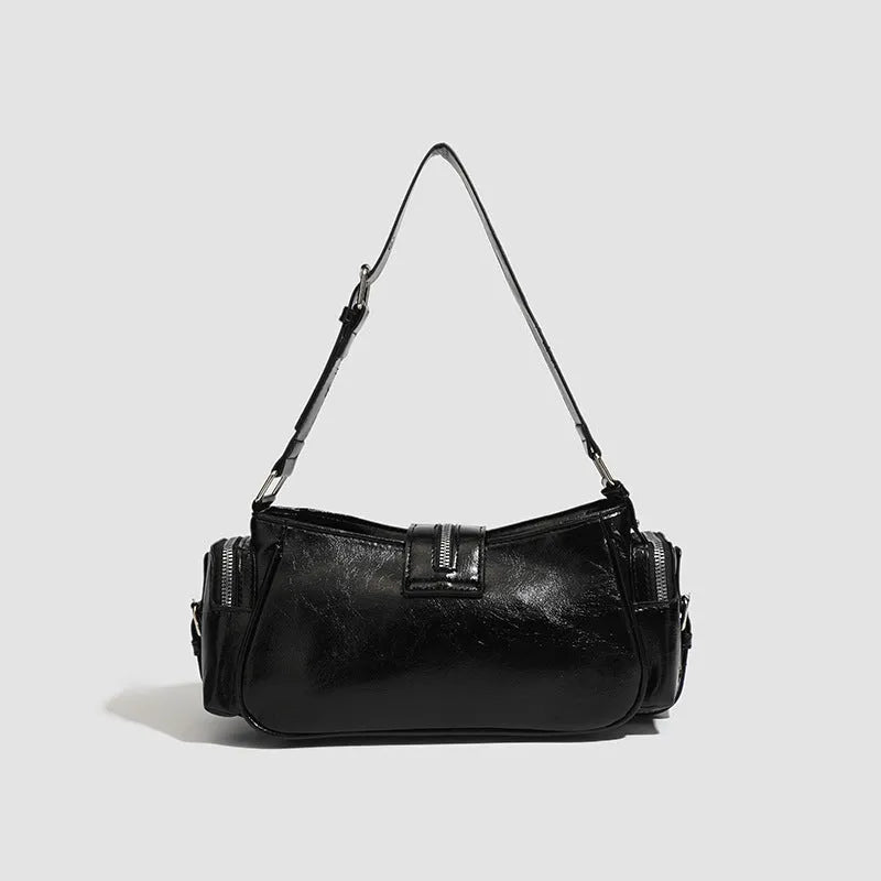 Black retro oil wax leather handbag with dumpling shape and internal organisation compartments