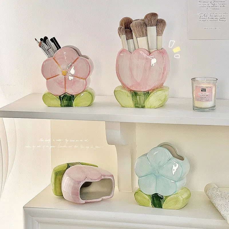 Ceramic flower pattern pen holder storage box on desk showing blue floral design